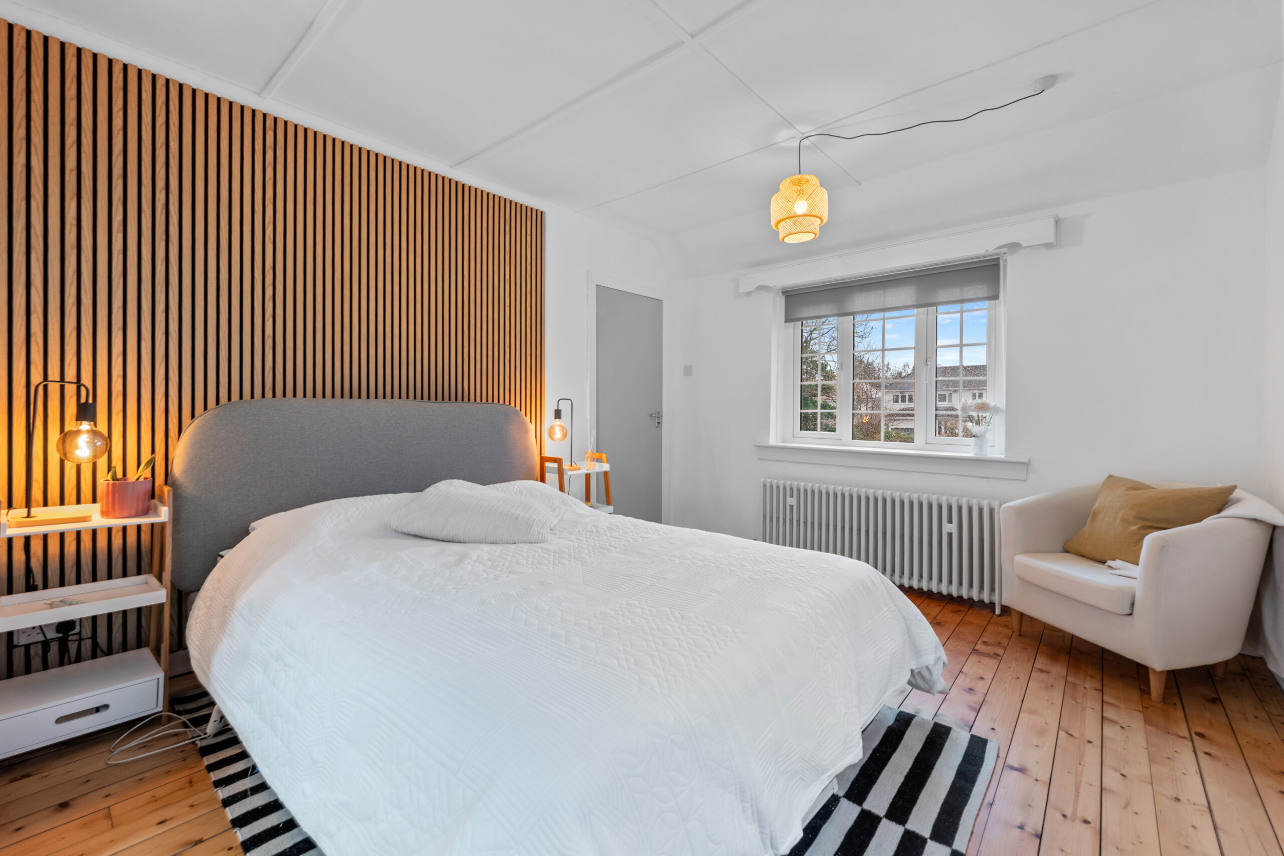 Bedroom with wood panelling feature wall 1