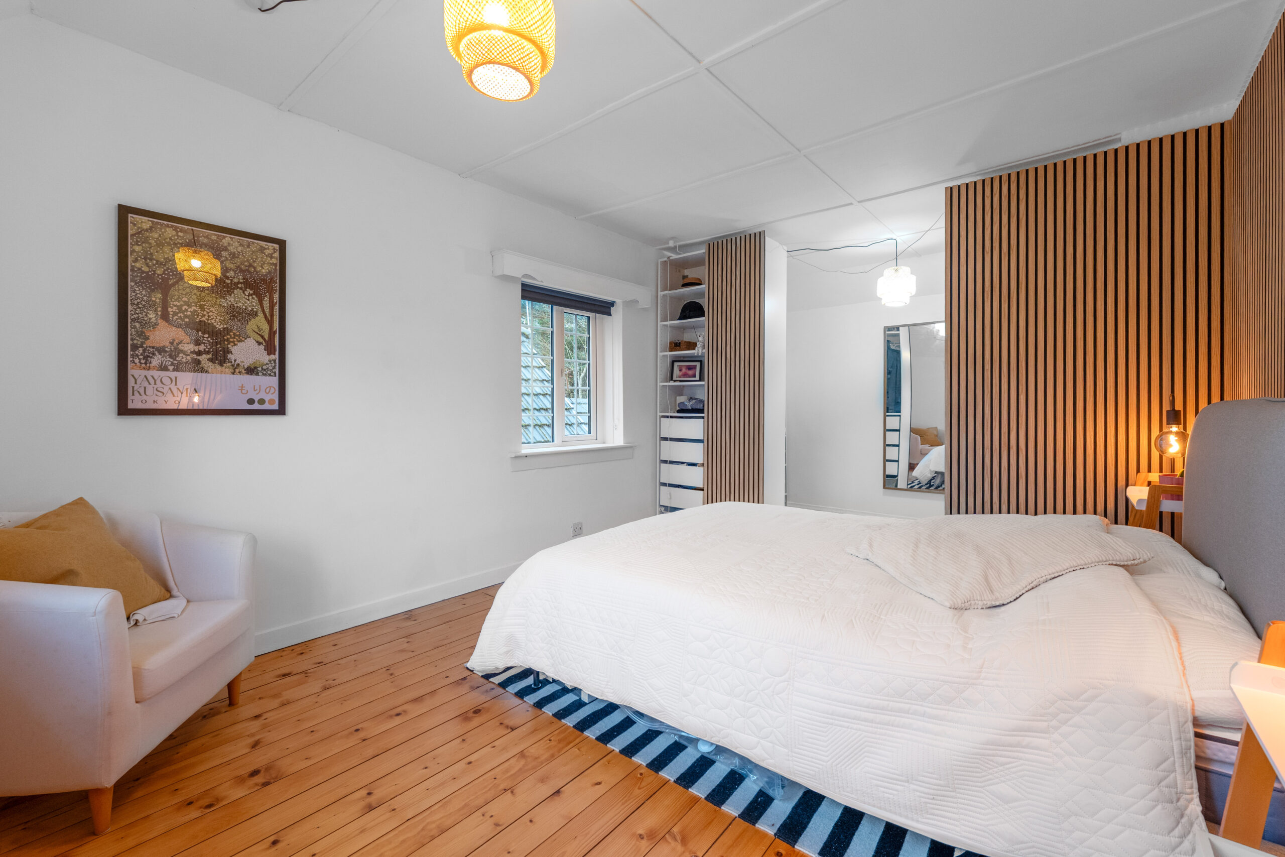 Bedroom with wood panelling feature wall 2