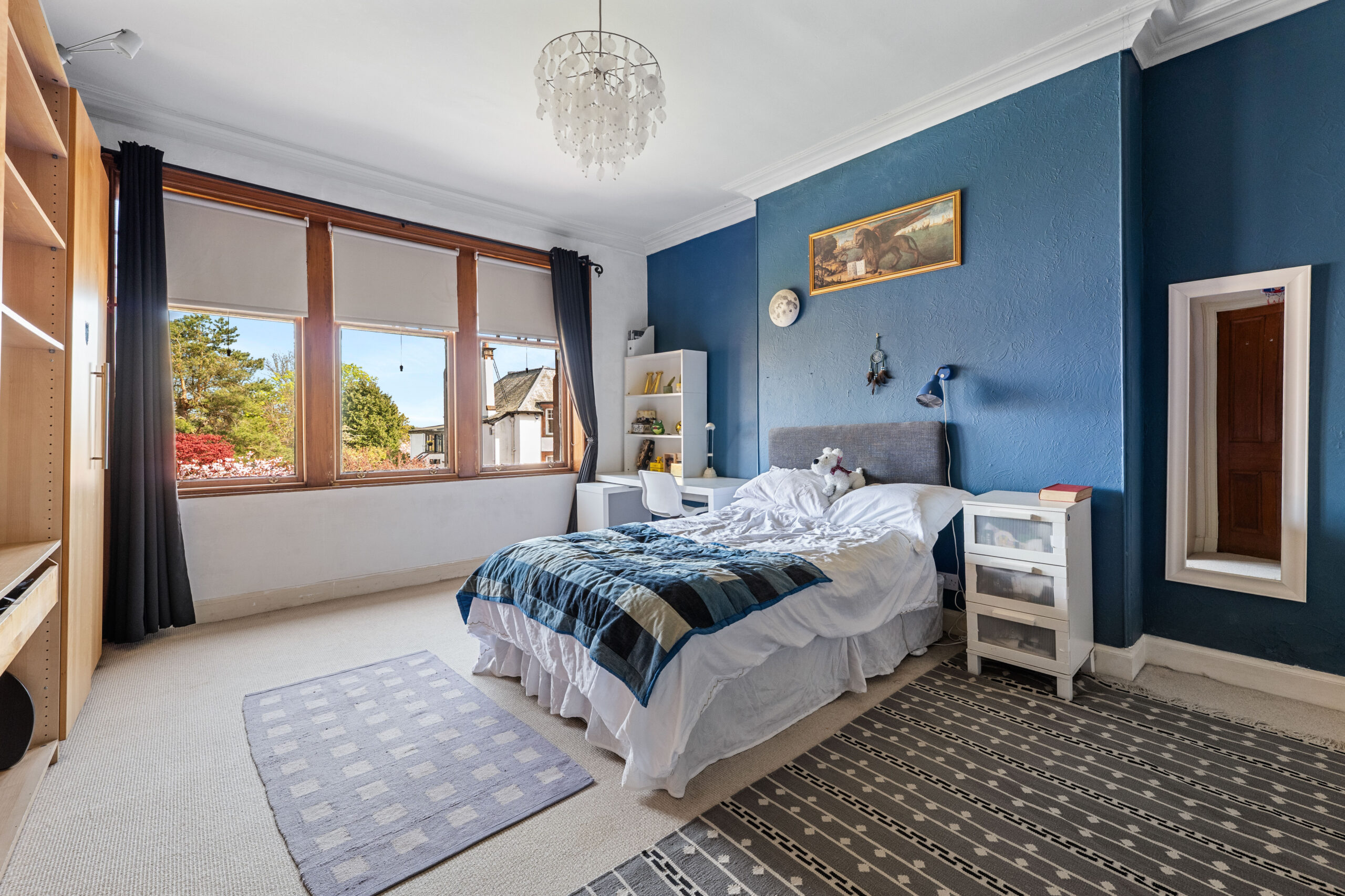 Bedroom with blue wall